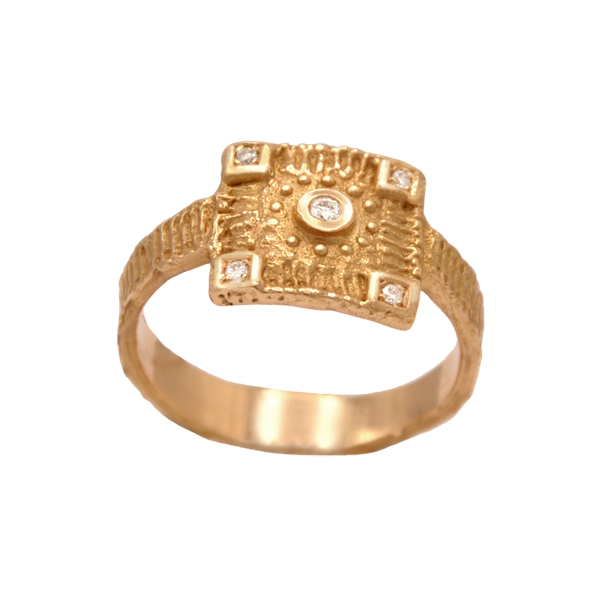 Bague en or rose 18k d'après l'empreinte d'un fossile d'oursin avec diamant